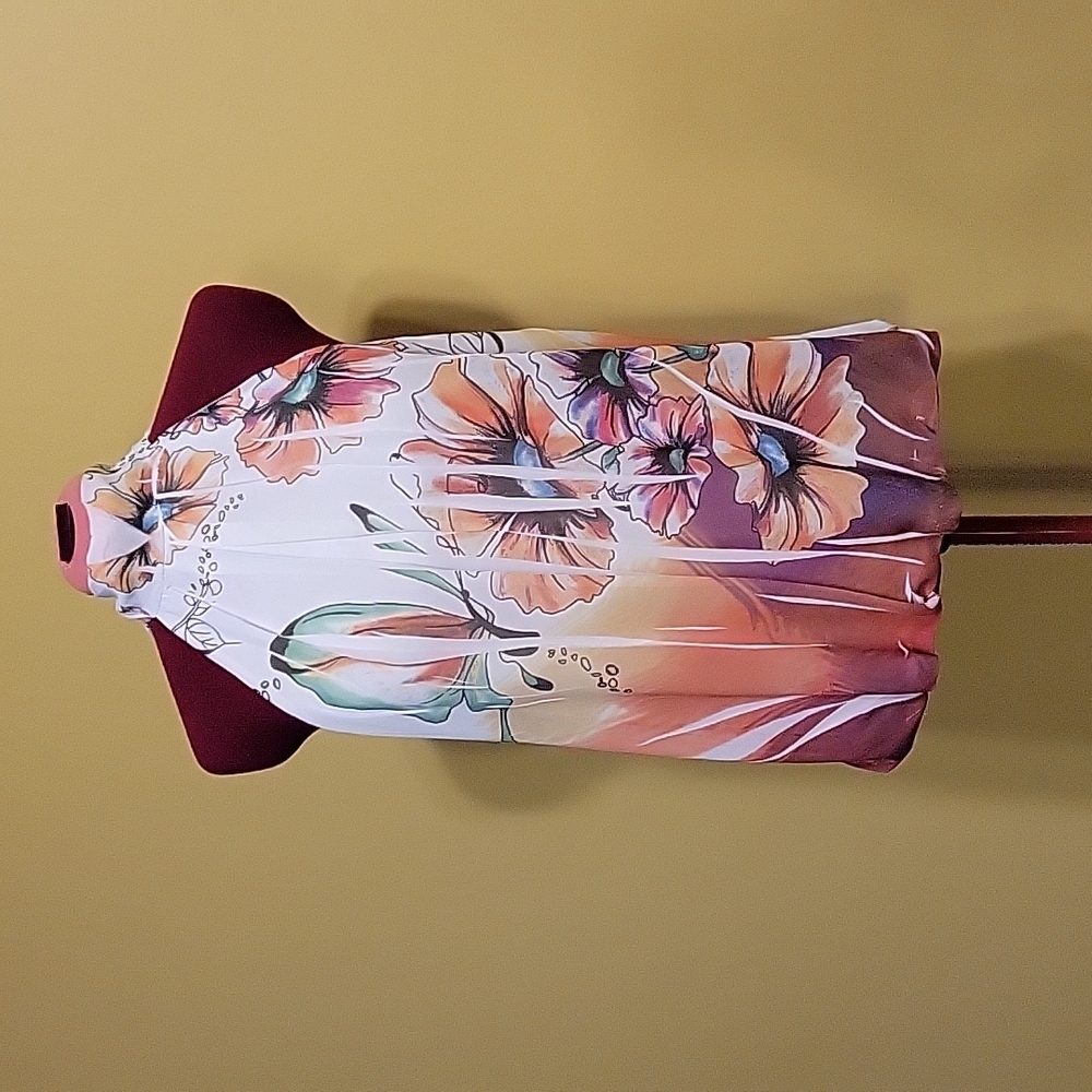 Dressy top size L but fits smaller